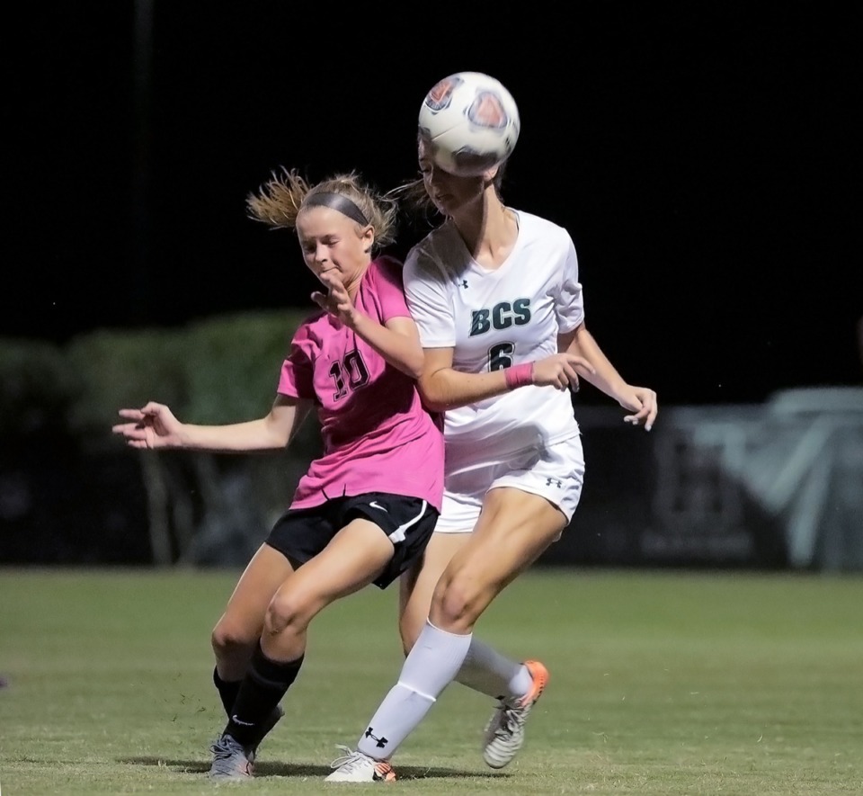 <strong>Houston High School's Ruby Langford (10) battles for a header against Briarcrest High School at Houston Oct. 2.</strong> (Patrick Lantrip/Daily Memphian)