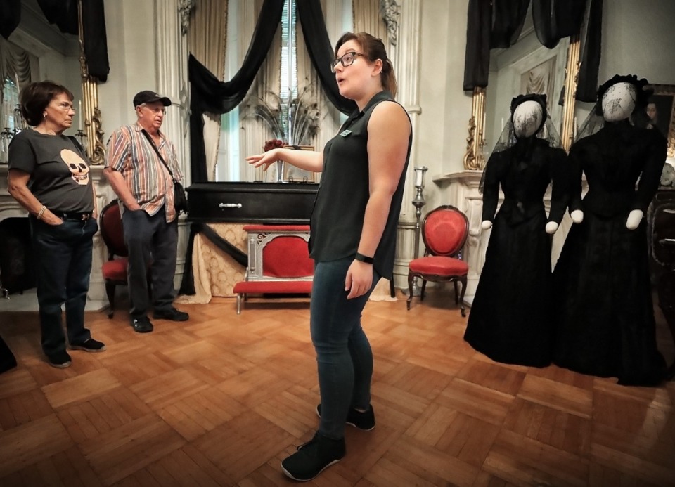 <strong>Docent Amanda Shaffery talks about Victorian era funeral practices during a tour as the Woodruff-Fontaine House in Victorian Village goes into mourning for the month of October with a collection of funereal artifacts on display including clothes, hair of the departed and jewelry.</strong> (Jim Weber/Daily Memphian)