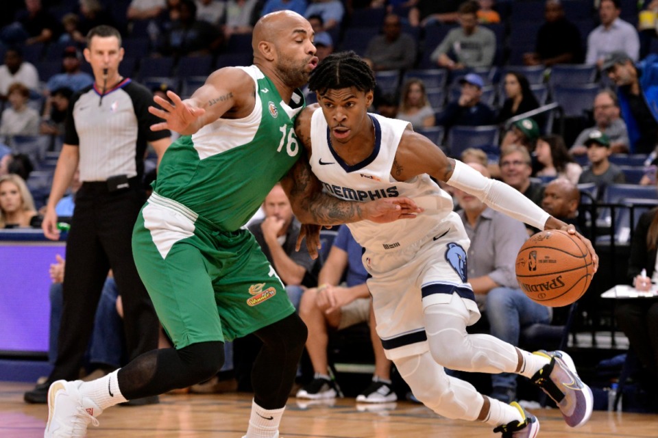 <strong>Memphis Grizzlies guard Ja Morant&nbsp; controls the ball against Maccabi Haifa guard Gregory Vargas in the first half of an exhibition NBA basketball game Sunday, Oct. 6, 2019, in Memphis.</strong> (Brandon Dill/AP)
