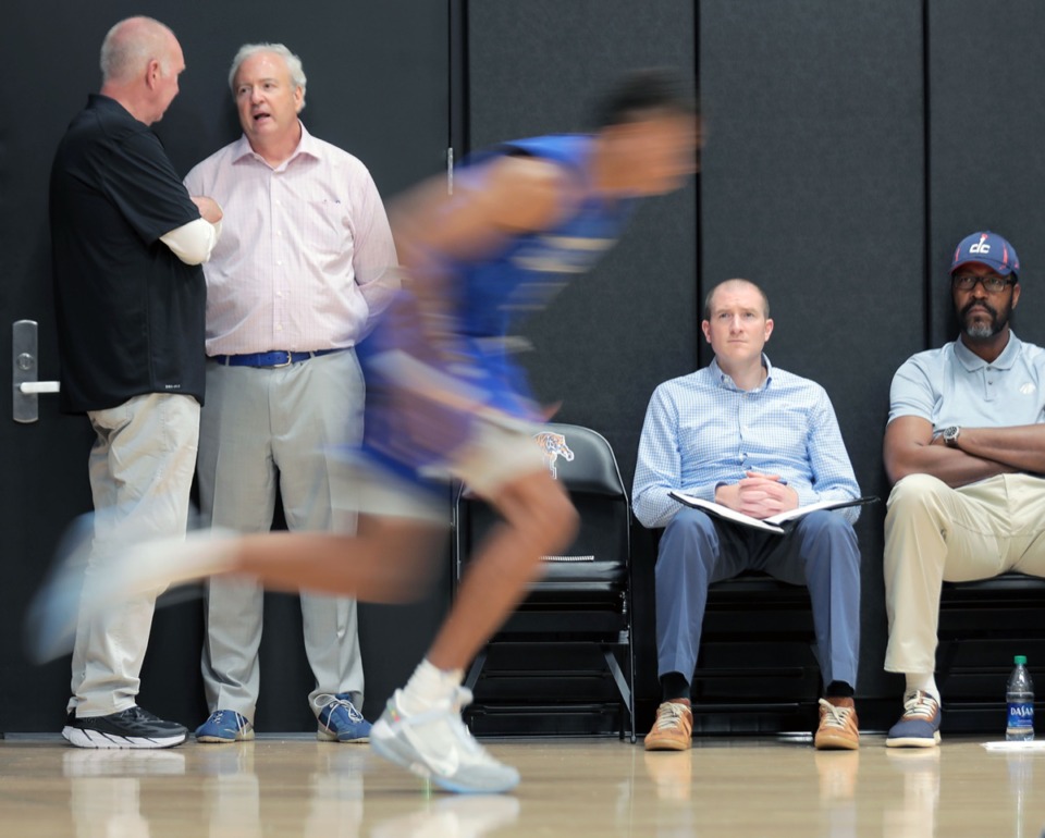 <strong>Memphis Grizzlies scout and former GM Chris Wallace talks to other NBA executives at Pro Day, held at the Laurie-Walton Family Basketball Center Oct. 7. About 60-70 scouts showed up, averaging more than &nbsp;two per team.</strong> (Patrick Lantrip/Daily Memphian)