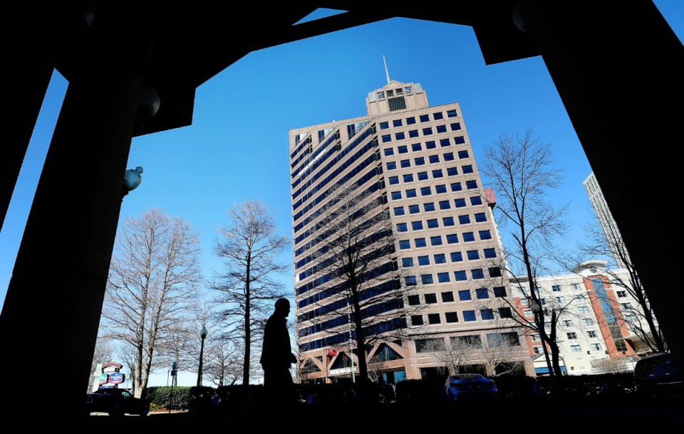 <strong>Raymond James &amp; Associates has plans to move from its Downtown office tower, the namesake and anchor for the 21-story building, to East Memphis.</strong> (Jim Weber/Daily Memphian file)