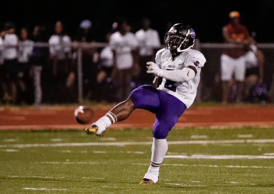 <strong>Southwind running back Romal Webb (punting during Sept. 20 game against Kirby) is No. 2 in rushing yards per game and in total rushing yards, #5 in yards per carry, and tied with Mac Fullen of Tipton-Rosemark for #4 in rushing touchdowns. </strong>(Mark Weber/Daily Memphian)
