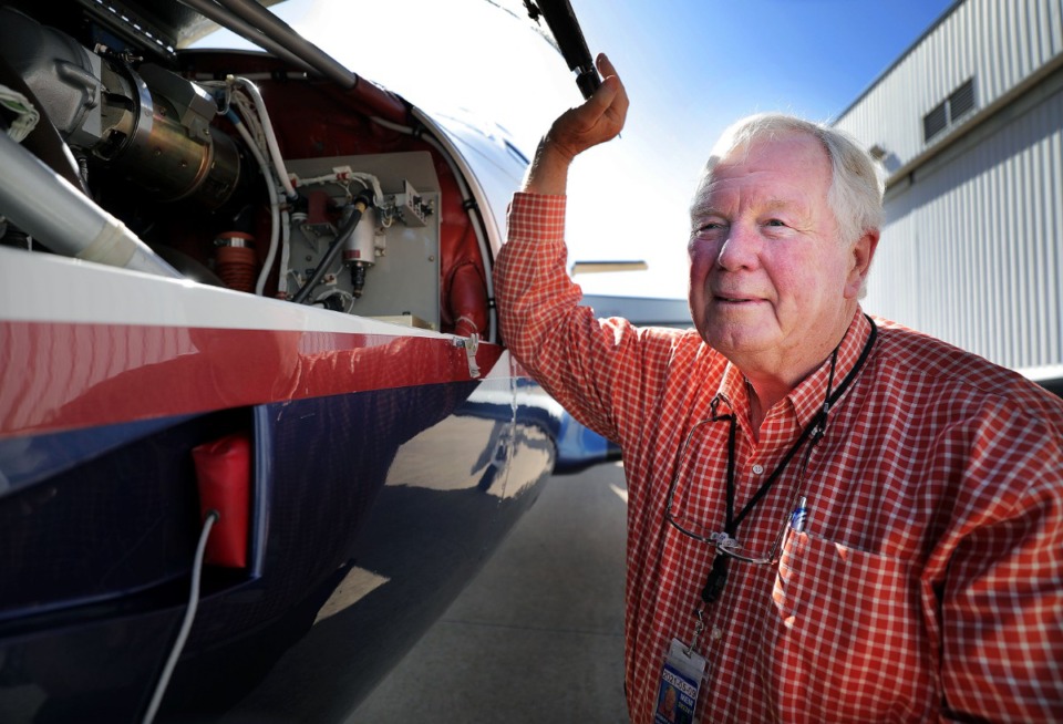 <strong>Wilson Air Center founder Bob Wilson lifts the hood of one of his personal planes at his small airfield.&nbsp;The longtime pilot will be honored in Las Vegas on Oct. 23 by the National Business Aircraft Association with one of the industry&rsquo;s highest honors, the John P. &ldquo;Jack&rdquo; Doswell Award.&nbsp;</strong>(Patrick Lantrip/Daily Memphian)