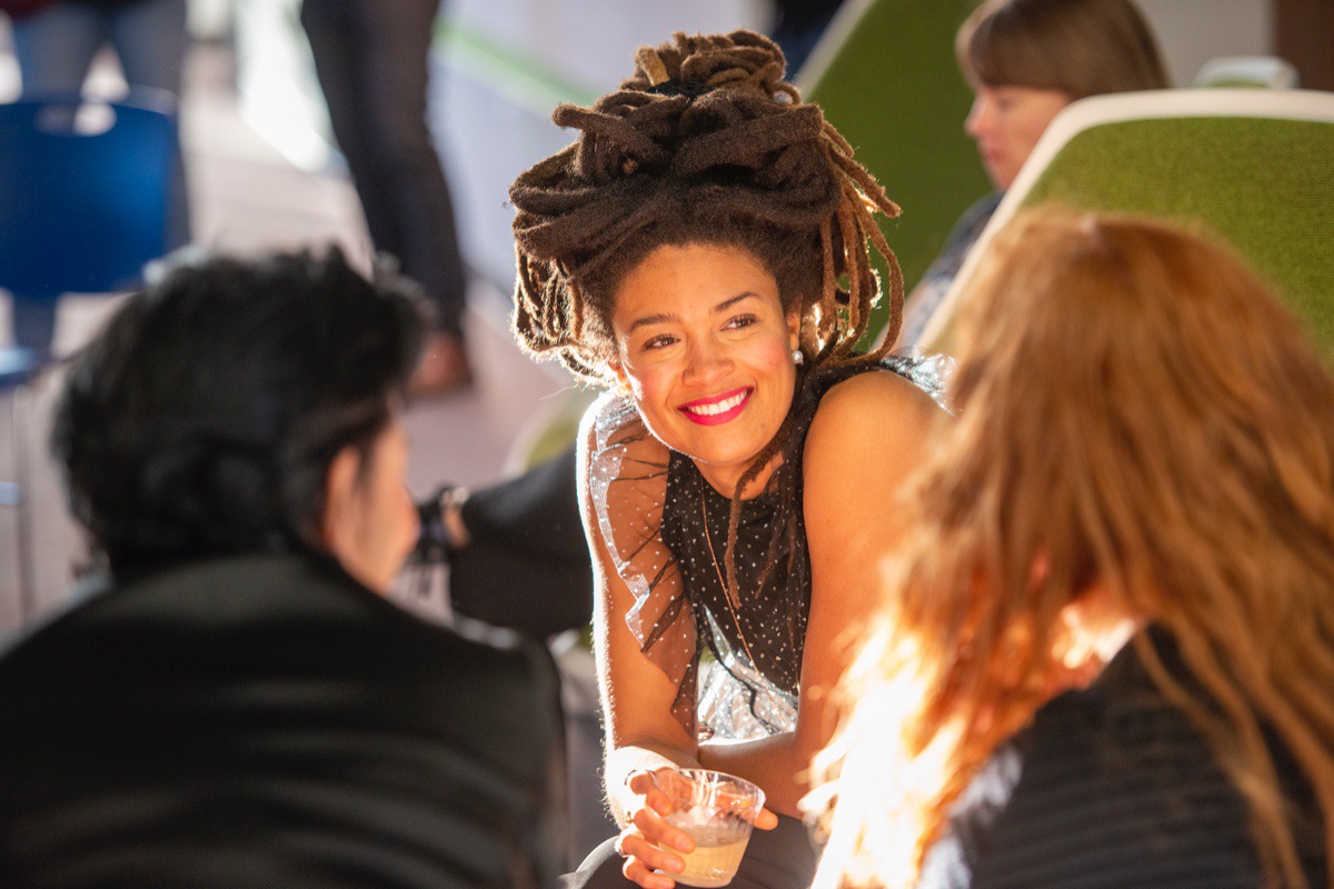 <strong>Native Memphis musician Valerie June talks with attendees of the DEVCON open house Oct. 17.</strong> (Greg Campbell/ Special to The Daily Memphian)