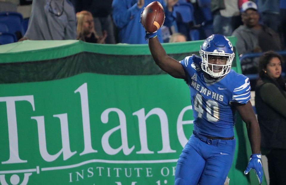 <strong>University of Memphis linebacker Thomas Pickens (40) celebrates after intercepting a Tulane pass during the Tigers game on Oct. 19, 2019, against the Green Wave at Liberty Bowl Memorial Stadium in Memphis.</strong> (Jim Weber/Daily Memphian)
