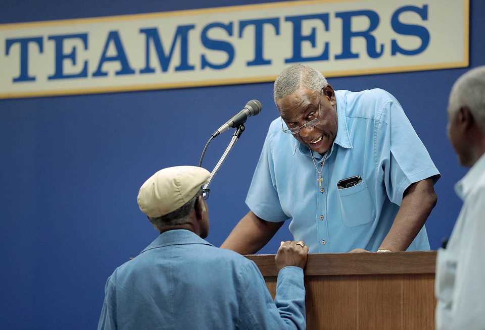 <strong>Tri-State Teamsters Retirees chapter president Willie Hardy talks with Charles Avant (left) as retirees gather to discuss their options to protect their pensions from a looming failure of the Central States pension fund.</strong> (Jim Weber/Daily Memphian)