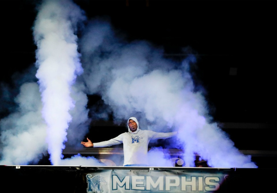 <strong>Tigers head coach Penny Hardaway is surrounded by smoke while being introduced during Memphis Madness at the FedExForum Thursday, Oct. 3, 2019.</strong> (Mark Weber/Daily Memphian)