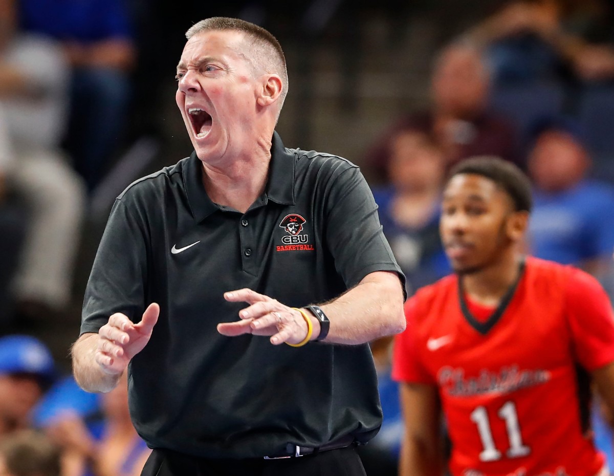 <strong>CBU head coach John T. Reilly reacts to action on the floor Oct.24 as his players battle the Tigers.</strong> (Mark Weber/Daily Memphian)