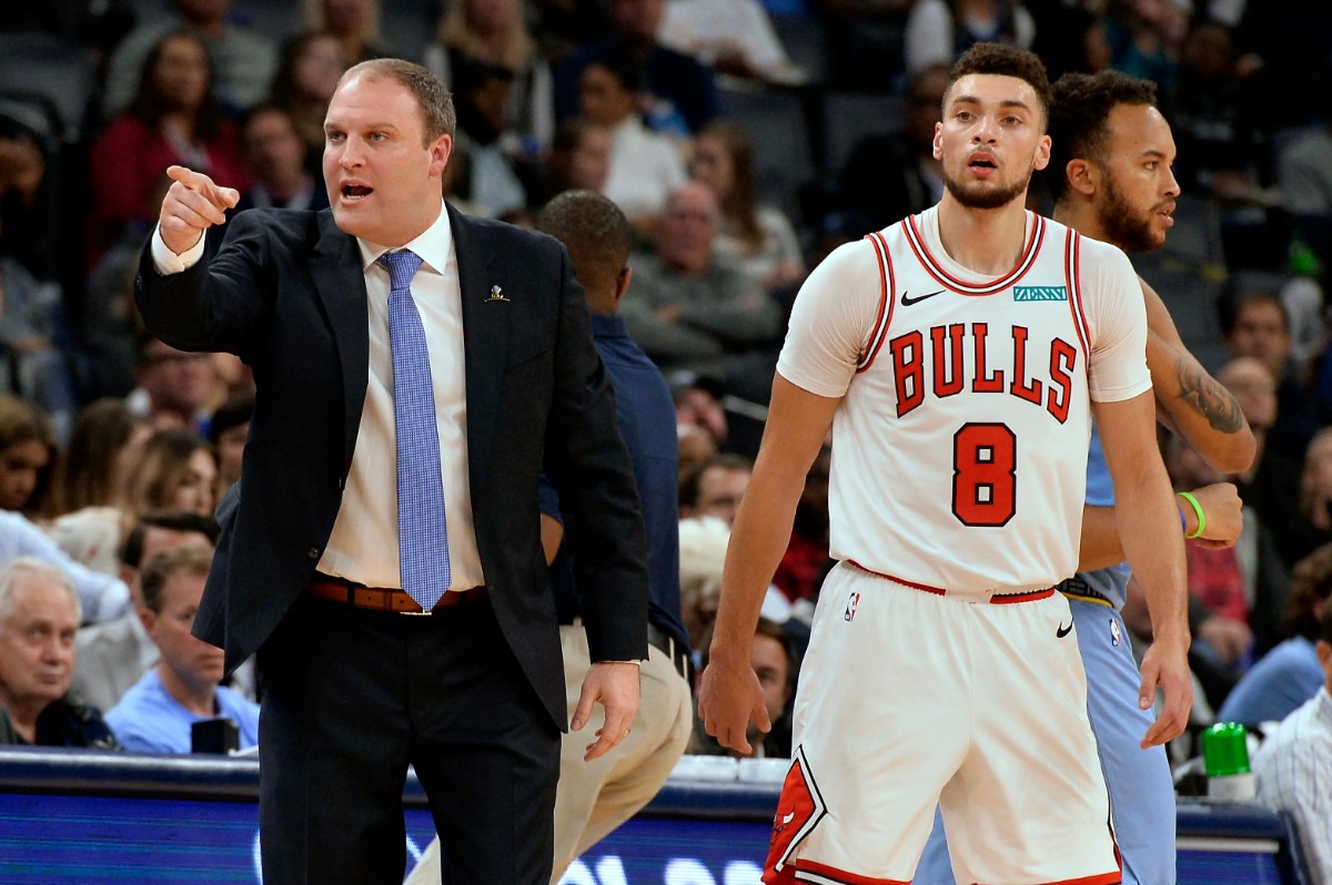<strong>Memphis coach Taylor Jenkins (left) charges past Chicago Bulls guard Zach LaVine (8) to challenge a call Oct. 25.</strong> (Brandon Dill/AP)