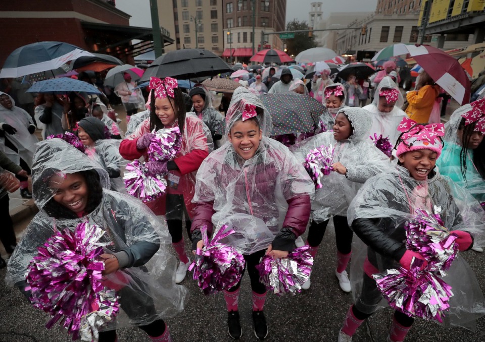 <strong>Germantown Middle School cheerleaders warm up before the start of the annual Susan G. Komen Race for the Cure.</strong> (Jim Weber/Daily Memphian)