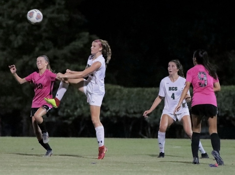 <strong>Houston High School Ruby Langford (10) fights for a header against a Briarcrest Christian School during an Oct. 2, 2019 match at Houston.</strong> (Patrick Lantrip/Daily Memphian)