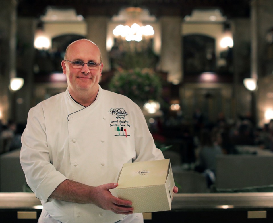 <strong>Peabody head pastry chef Konrad Spitzbart holds a box of homemade Halloween candy in the lobby of the Peabody Hotel Oct. 23.</strong> (Patrick Lantrip/Daily Memphian)