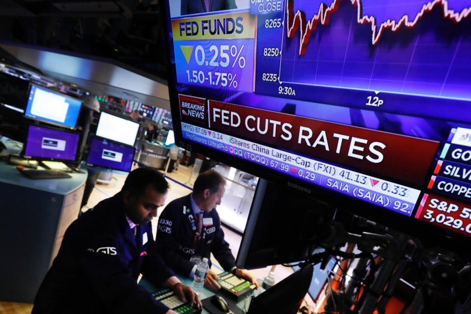 <strong>A television screen on the floor of the New York Stock Exchange shows the rate decision of the Federal Reserve Oct. 30, 2019.</strong> (Richard Drew/AP)