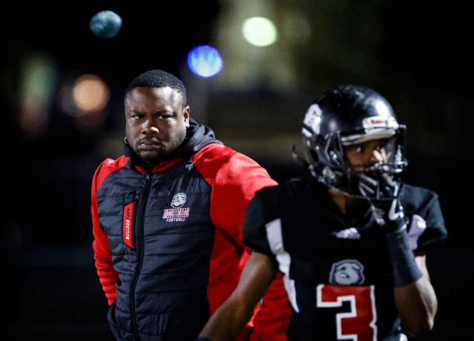 <strong>Middle College head coach LeNorris Staples (left) glowers as his team takes on Westwood Oct. 31.</strong> (Mark Weber/Daily Memphian)