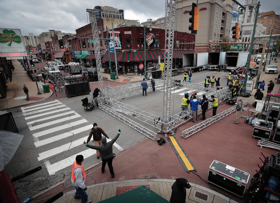 <strong>Riggers set up a stage on Beale Street Oct. 31 for the upcoming College Gameday broadcast before the University of Memphis game against SMU.</strong> (Jim Weber/Daily Memphian)
