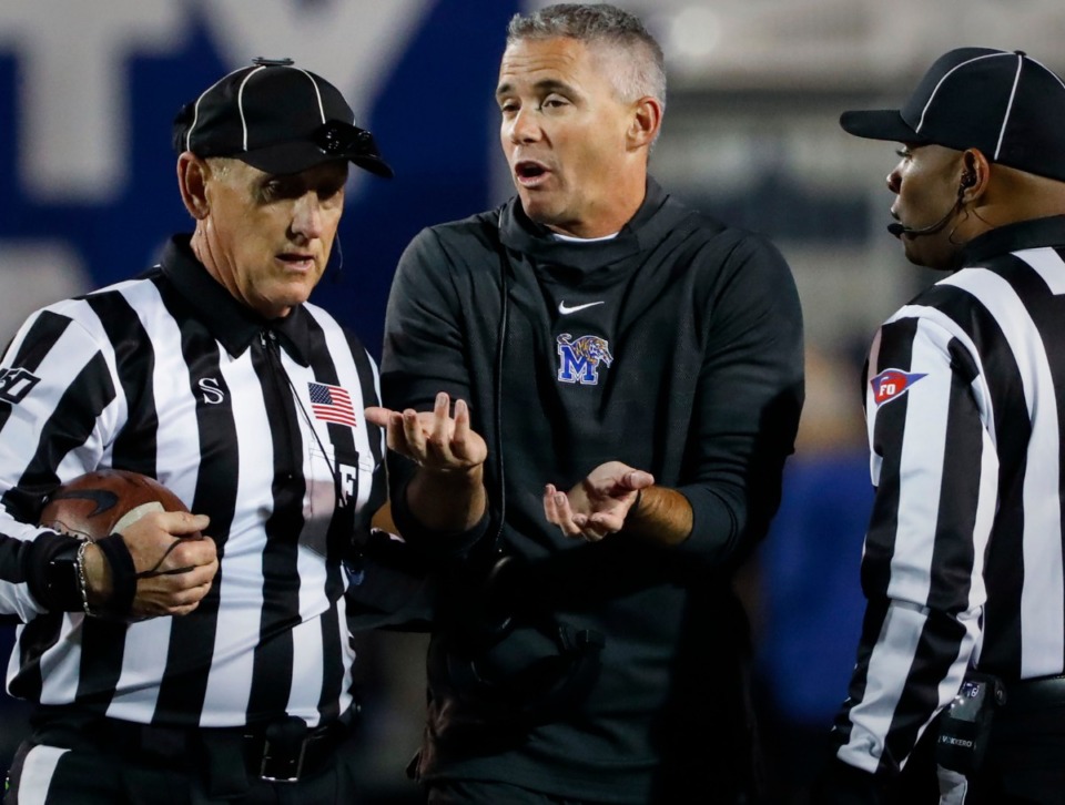 <strong>University of Memphis head coach Mike Norvell (middle) argues a call with the officials during the game against SMU Saturday, Nov. 2, 2019, at Liberty Bowl Memorial Stadium.</strong> (Mark Weber/Daily Memphian)