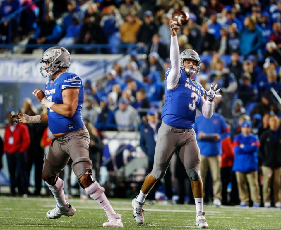 <strong>University of Memphis quarterback Brady White (right) makes a throw against the SMU defense during the game Saturday, Nov. 2, 2019, at Liberty Bowl Memorial Stadium.</strong> (Mark Weber/Daily Memphian)