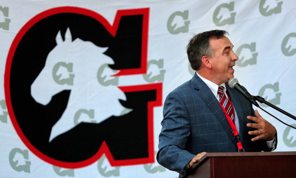 <strong>Germantown School District Superintendent Jason Manuel speaks to a small group of boosters and business leaders during a ceremony on July 10, 2019 at Houston High School to mark the start of construction on a new fieldhouse to be located adjacent to the football field.</strong> (Jim Weber/Daily Memphian file)