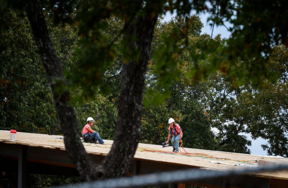 <strong>Construction workers lay roofing on a new activity center at Youth Villages' Bartlett campus Wednesday, Nov. 6, 2019.</strong> (Mark Weber/Daily Memphian)