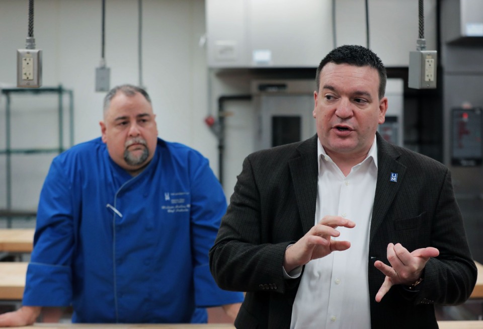 <strong>Tim Flohr (right), program manager for the Kemmons Wilson Culinary Institute, and chef instructor William Mullins (left) give a tour on Nov. 7, 2019 of the former L'&Eacute;cole Culinaire space in Cordova that the University of Memphis took over earlier this year.</strong> (Patrick Lantrip/Daily Memphian)