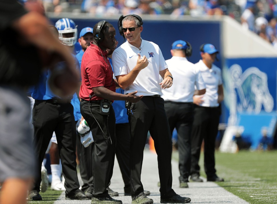 <strong>University of Memphis head football coach Mike Norvell talks with an assistant during the second half of a 55-24 victory of Southern University at the Liberty Bowl Saturday, Sept. 7.</strong> (Patrick Lantrip/Daily Memphian)