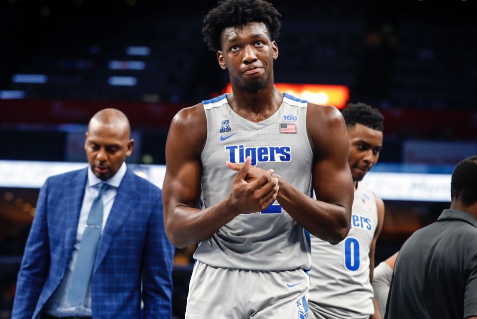 <strong>Memphis center James Wiseman (middle) pushes his hand during a timeout against UIC Nov. 8 at FedExForum.</strong> (Mark Weber/Daily Memphian)