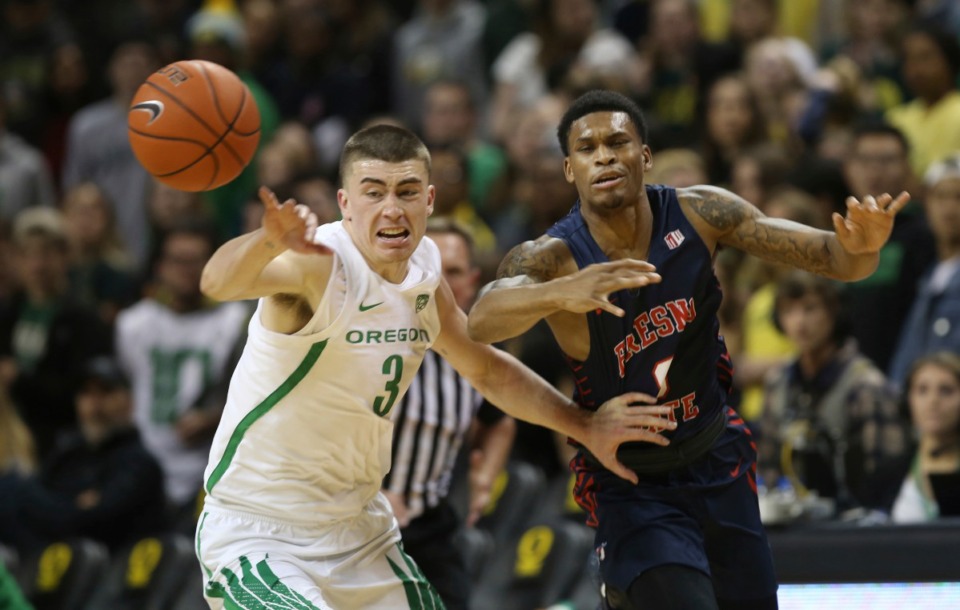 <strong>Oregon's Payton Pritchard (left, seen Nov. 5 in Eugene, Ore.) is the threat the Tigers need to blunt.</strong> (Chris Pietsch/AP)