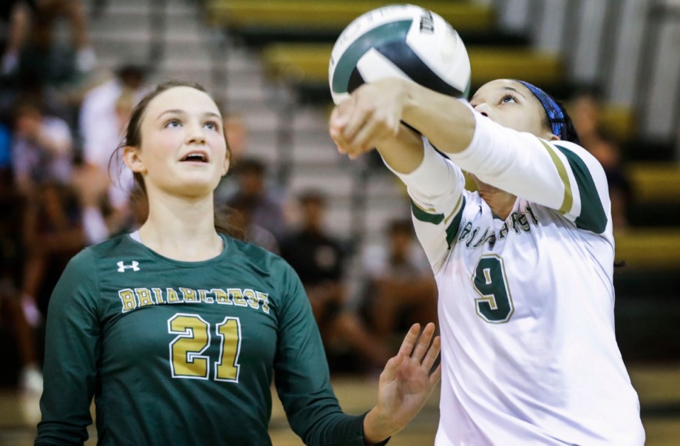 <strong>Briarcrest's Aziah Buckner (right) hits a return shot in front of teammate Emma Perkins on Aug. 29, 2019.</strong> (Mark Weber/Daily Memphian)