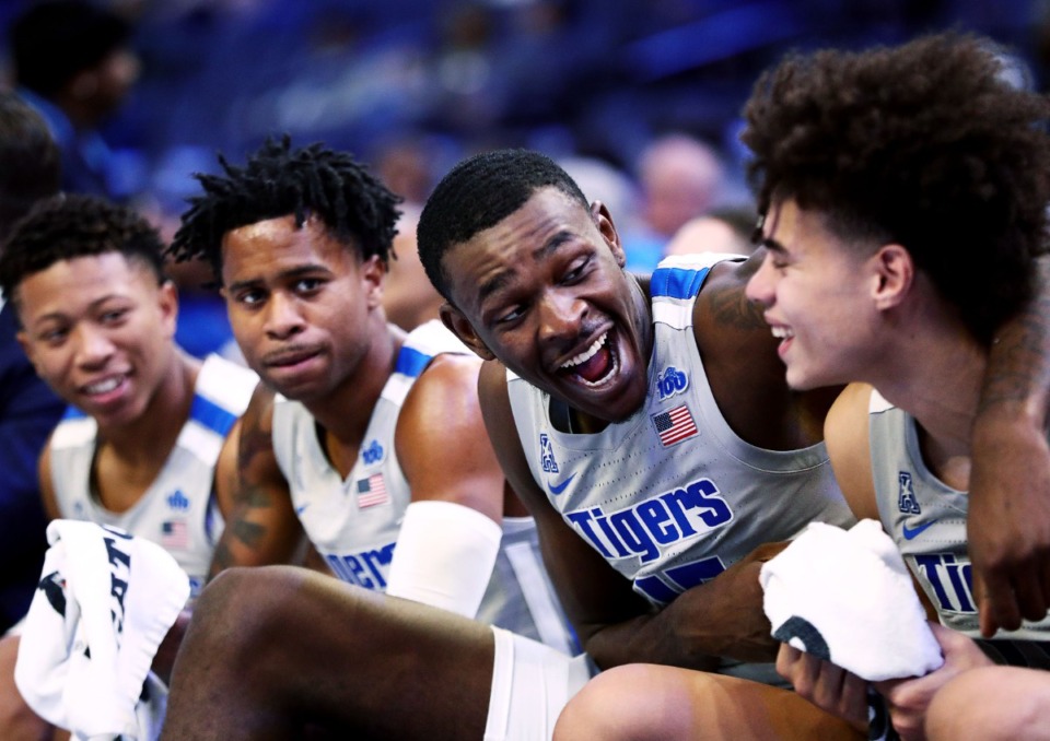 <strong>University of Memphis forward Lance Thomas (15) laughs with teammates during a home win against Alcorn State University at FedExForum on Nov. 16, 2019.</strong> (Patrick Lantrip/Daily Memphian)