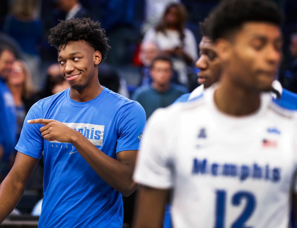 <strong>Suspended center James Wiseman points to fans after the Tigers defeat Little Rock Nov. 20 at FedExForum.</strong> (Mark Weber/Daily Memphian)