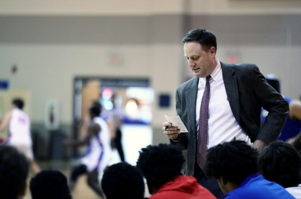 <strong>New Memphis University School basketball coach David Willson goes over some adjustments during a home win against Margolin Hebrew Academy on Nov. 19, 2019.</strong> (Patrick Lantrip/Daily Memphian)