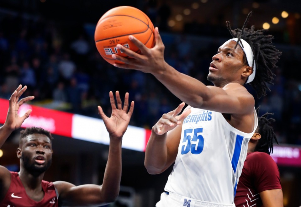 <strong>Memphis forward Precious Achiuwa drives to the basket against the Little Rock defense on Wednesday, Nov. 20, at FedExForum. The Tigers will likely rely heavily on Achiuwa in James Wiseman&rsquo;s absence. The former five-star recruit leads the team in total rebounds and also has scored in double digits in all but one game.&nbsp;</strong>(Mark Weber/Daily Memphian)