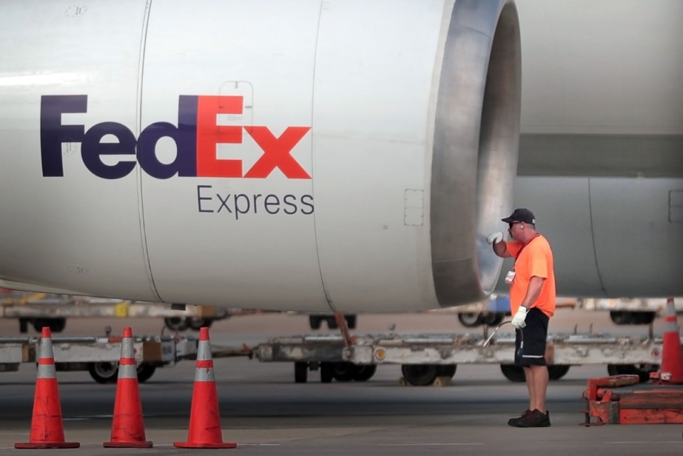 <strong>Planes are inspected and unloaded at the FedEx hub where officials announced plans on September 27, 2019 to hire an additional 3,250 people in the Memphis to handle peak season shipping traffic.</strong> (Jim Weber/Daily Memphian file photo)