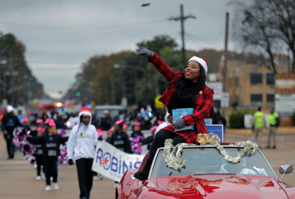 <strong>Tennessee State Senator Katrina Robinson tosses candy to eager children at the Memphis Christmas Parade in Whitehaven Nov. 23, 2019.</strong> (Patrick Lantrip/Daily Memphian)