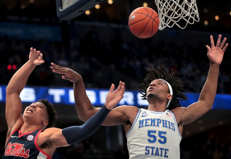 <strong>University of Memphis forward Precious Achiuwa fouls Ole Miss guard Breein Tyree on a shot attempt during the Tigers' game on Nov. 23, 2019, against Mississippi at FedExForum.</strong> (Jim Weber/Daily Memphian)