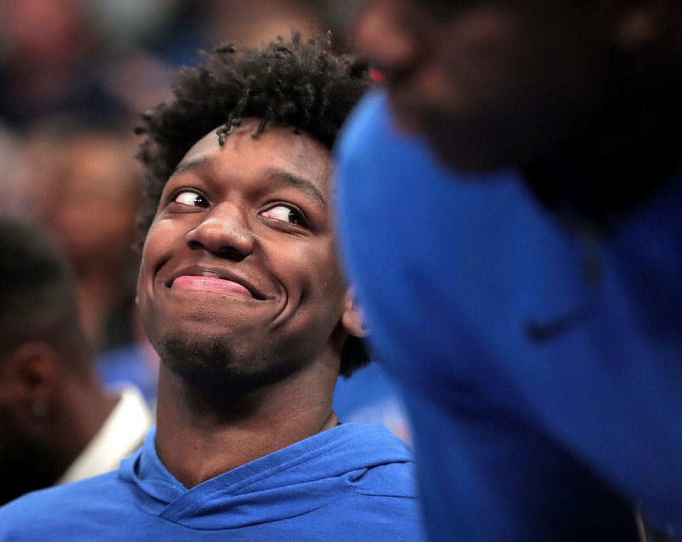 <strong>University of Memphis center James Wiseman jokes with teammates on the bench during the Tigers' game on Nov. 23, 2019, against Mississippi at FedExForum.</strong> (Jim Weber/Daily Memphian)