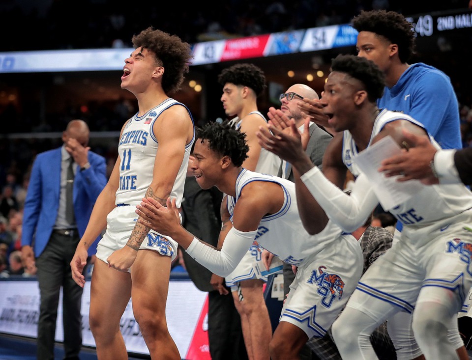 <strong>The University of Memphis bench reacts as the Tigers make a point surge against Ole Miss during the their game on Nov. 23, 2019, against Mississippi at FedExForum.</strong> (Jim Weber/Daily Memphian)