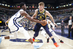 <strong>Forward Jaren Jackson Jr. (13) grabs the ball from Indiana Pacers forward Domantas Sabonis (11) Nov. 25. Jackson led the Grizz with 28.</strong> (Michael Conroy/AP)