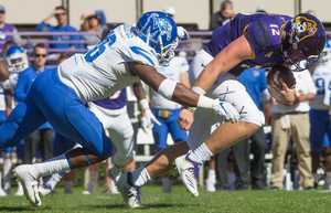 <strong>East Carolina's Rowe Mellott is tackled by Nehemiah Augustus of&nbsp; the University of Memphis during ECU's game against the Tigers in Greenville, N.C., on Nov. 3, 2018.</strong> (Juliette Cooke/Courtesy of the Greenville Daily Reflector)