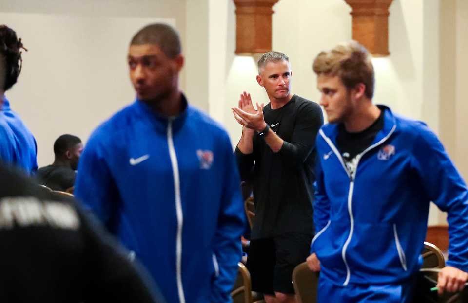 <strong>Tigers coach Mike Norvell cheers on his players during a special-teams meeting on game day at the University of Memphis Holiday Inn. The Tigers football team has a fully programmed game day that includes team meetings, ball drills, stretching and a pre-game meal.</strong> (Houston Cofield/Daily Memphian)