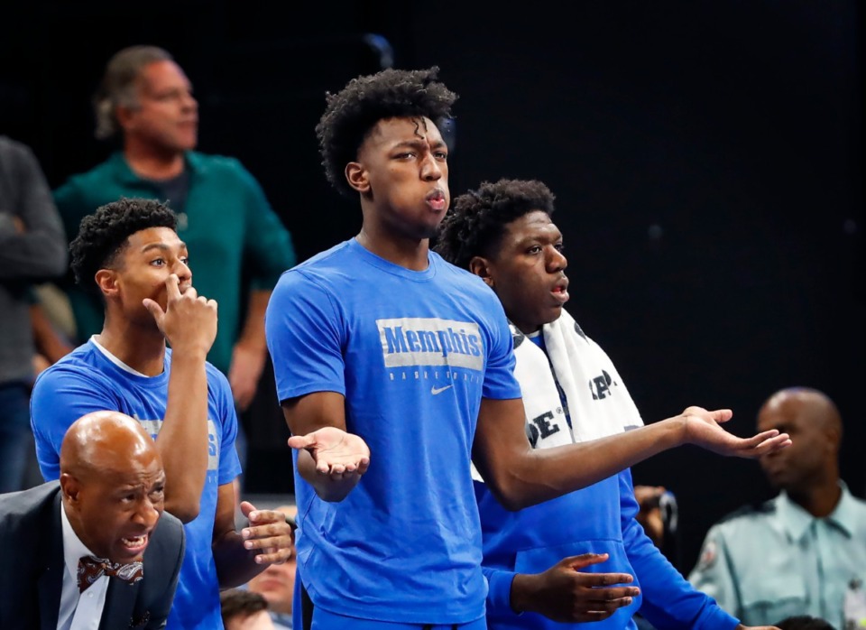<strong>Memphis suspended center James Wiseman (middle) watches action against Little Rock from the bench Wednesday, Nov. 20, 2019 at the FedExForum.</strong> (Mark Weber/Daily Memphian)