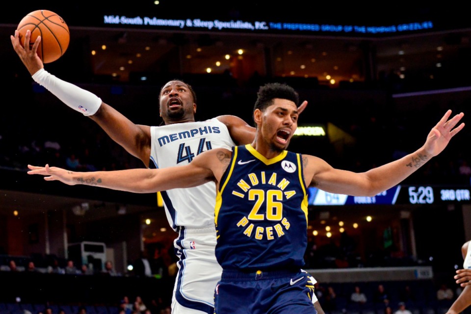 <strong>Grizzlies forward Solomon Hill (44) outmaneuvers Indiana Pacers guard Jeremy Lamb (26) Dec. 2 at FedExForum.</strong> (Brandon Dill/AP)