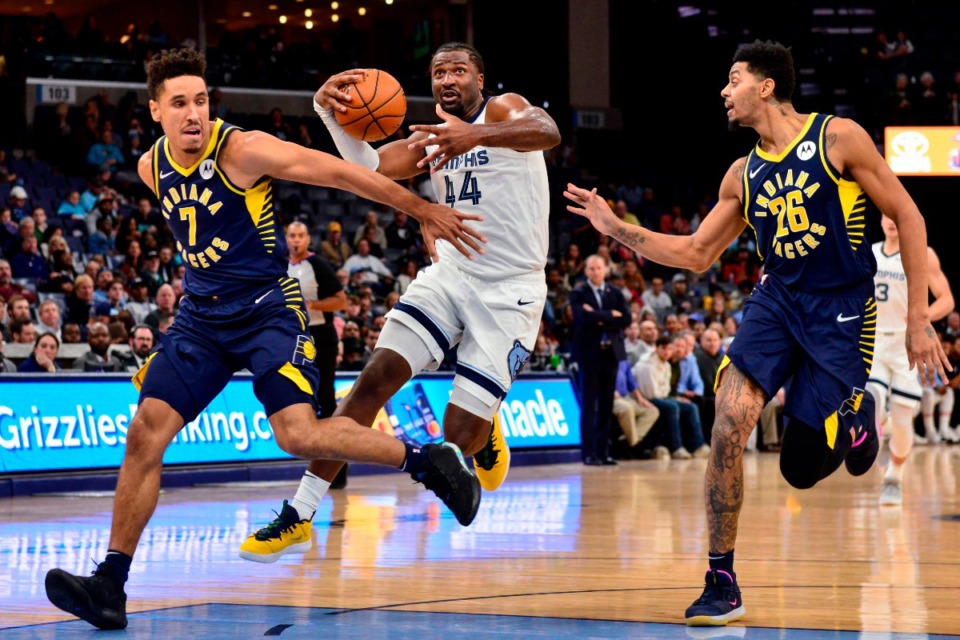 <strong>Memphis Grizzlies forward Solomon Hill (44) drives against Indiana Pacers guards Malcolm Brogdon (7) and Jeremy Lamb (26) in the second half of an NBA basketball game Monday, Dec. 2, 2019.</strong>&nbsp;(AP Photo/Brandon Dill)