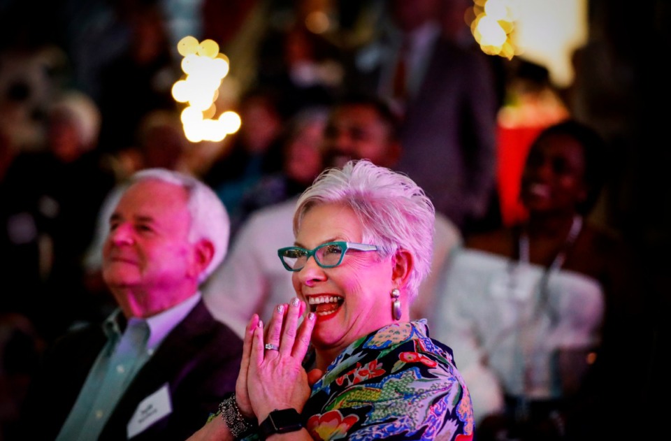 <strong>Cynthia Ham smiles while watching a tribute video during her retirement party Wednesday, Dec. 4, 2019.</strong> (Mark Weber/Daily Memphian)