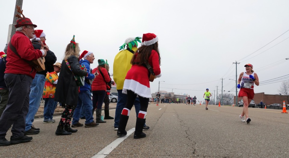 <strong>The Memphis Ukulele Flash Mob entertained the runners in the St. Jude Marathon in Memphis on Saturday morning Dec. 7, 2019. More than 25,000 runners representing all 50 states and 26 countries participated.</strong> (Karen Pulfer Focht/Special to The Daily Memphian)