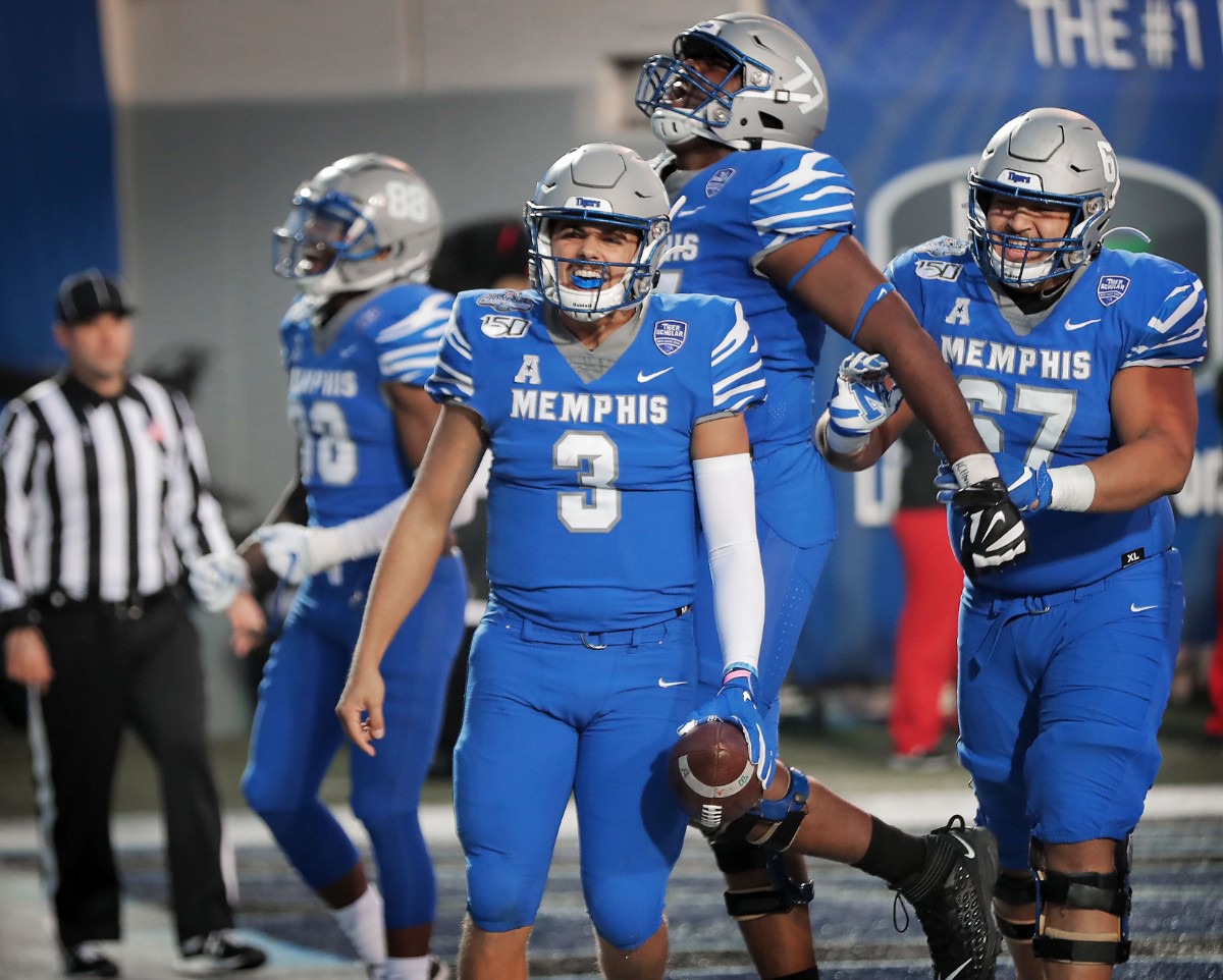 <strong>University of Memphis quarterback Brady White (3) celebrates after scorig a keeper touchdown against Cincinnati in the second half of the Tiger's AAC Championship game on Dec. 7, 2019, against the Bearcats at the Liberty Bowl Memorial Stadium.</strong> (Jim Weber/Daily Memphian)