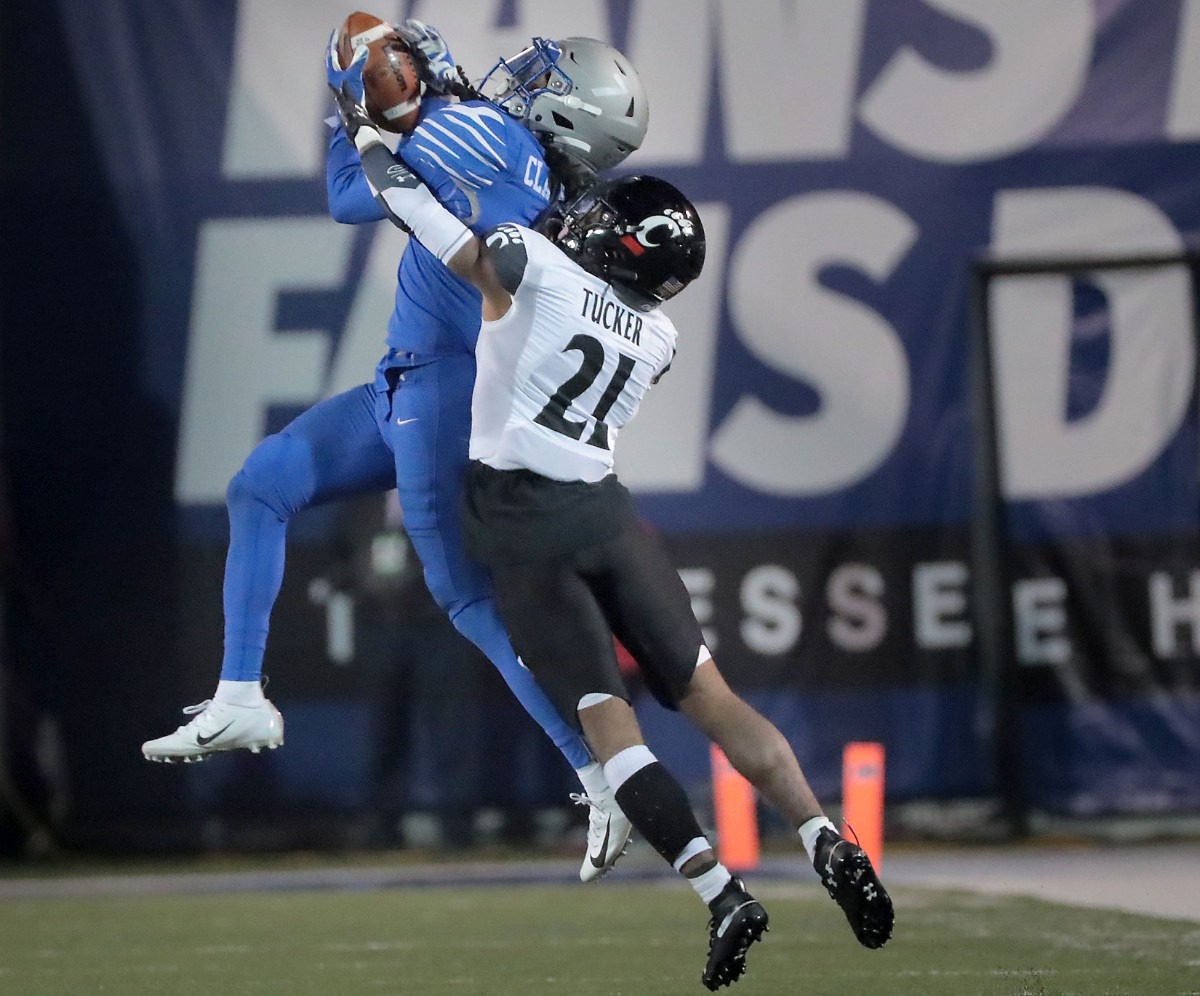 <strong>University of Memphis defensive back Chris Claybrooks picks of a pass intended for Cincinnati's Tre Tucker during the second half of the Tiger's AAC Championship game on Dec. 7, 2019, against the Bearcats at the Liberty Bowl Memorial Stadium.</strong> (Jim Weber/Daily Memphian)