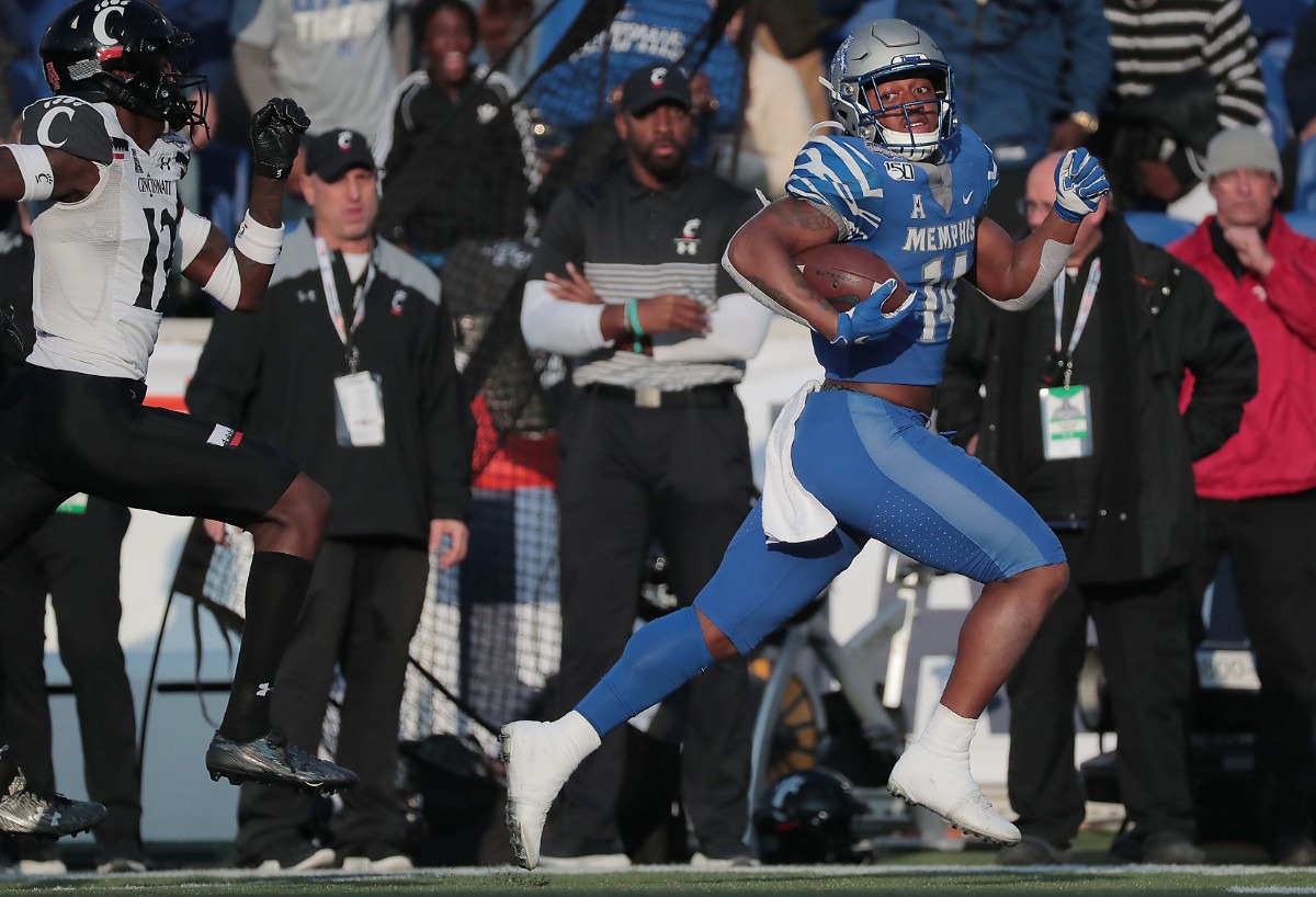 <strong>University of Memphis receiver Antonio Gibson (14) breaks away for a touchdown against Cincinnati's during the first half of the Tiger's AAC Championship game on Dec. 7, 2019, against the Bearcats at the Liberty Bowl Memorial Stadium.</strong> (Jim Weber/Daily Memphian)