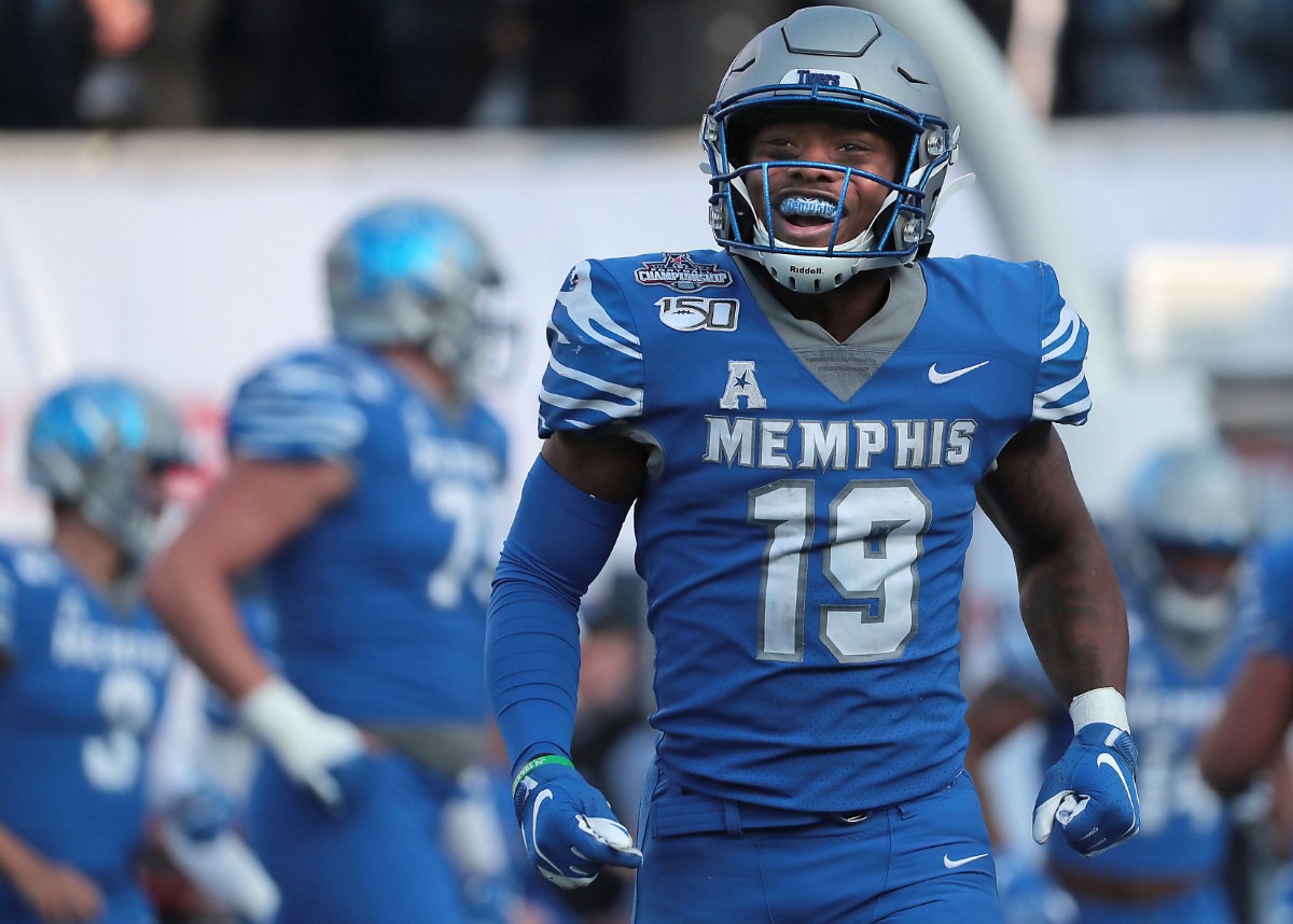 <strong>University of Memphis running back Kenneth Gainwell (19) reacts after a touchdown run by Antonio Gibson during the first half of the Tiger's AAC Championship game on Dec. 7, 2019, against the Bearcats at the Liberty Bowl Memorial Stadium.</strong> (Jim Weber/Daily Memphian)