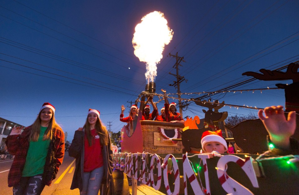 <strong>The Bluff City Balloons light up the night with a balloon torch during Bartlett Christmas Parade on December 7, 2019.</strong> (Ziggy Mack/special to the Daily Memphian)